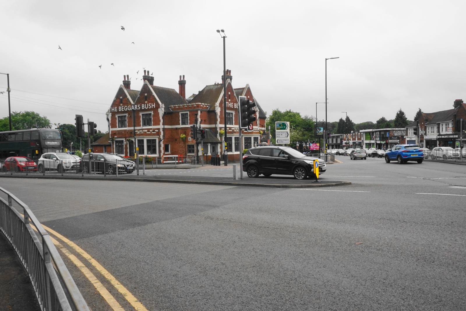 The Beggars Bush pub beside its busy crossroads junction