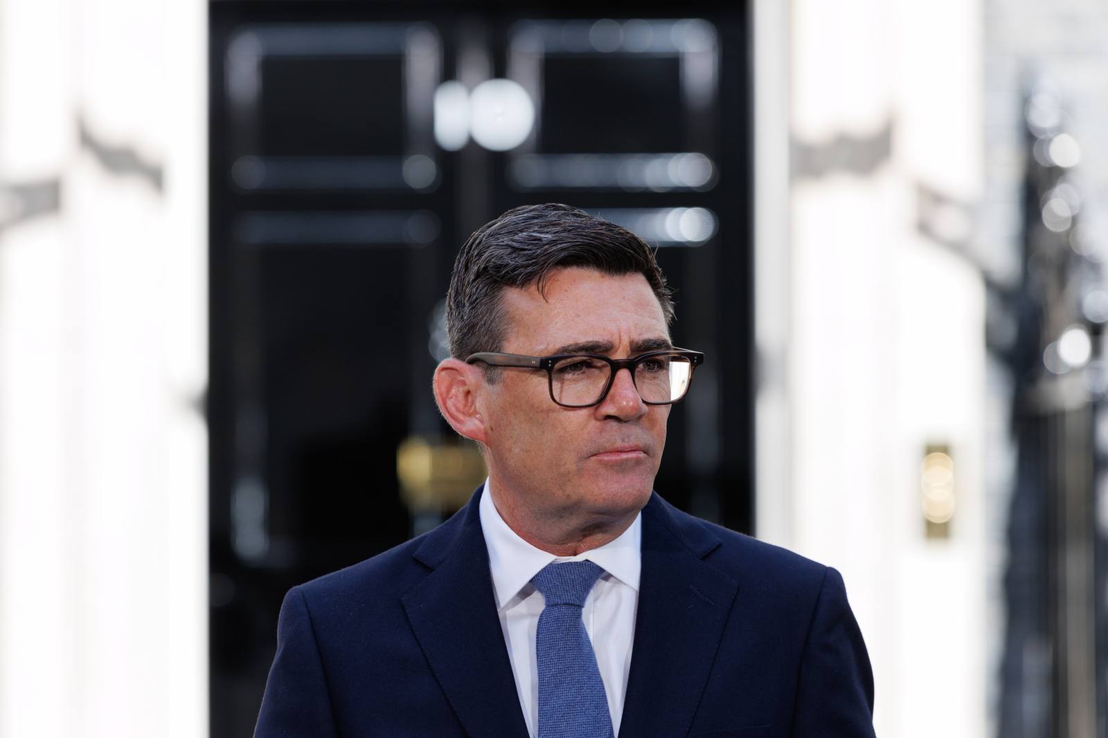 Andy Burnham in a suit outside the door of 10 Downing Street