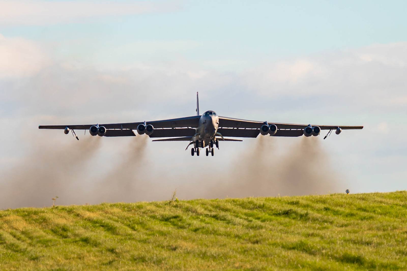 A B-52H Stratofortress taking off from RAF Fairford, seen from the front