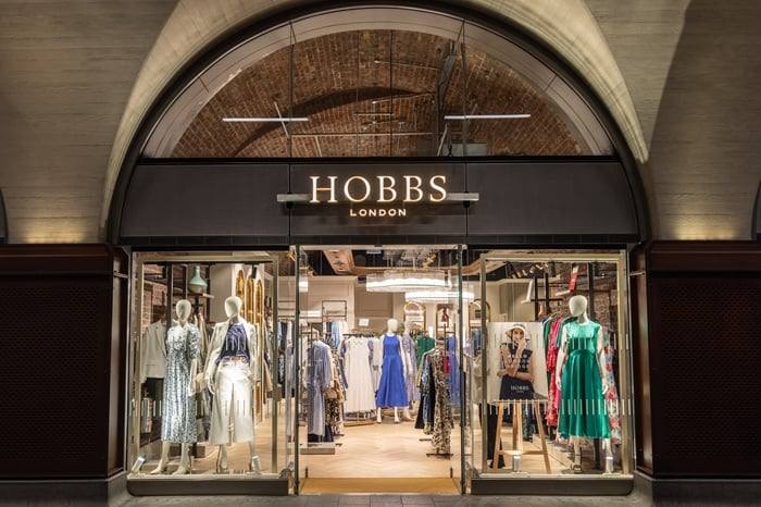 The Hobbs London store under the brick arch at London Bridge Station, with dresses on display