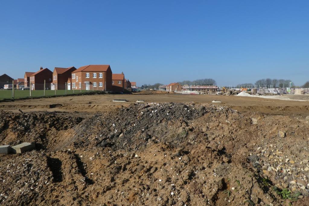 New houses under construction on a building site