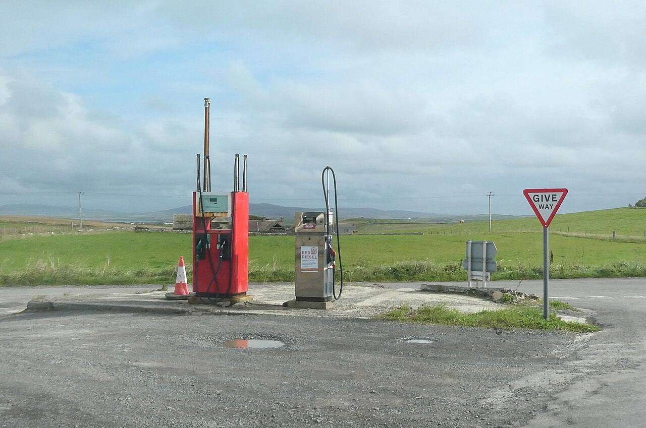 Fuel pumps including a red diesel pump at a rural forecourt