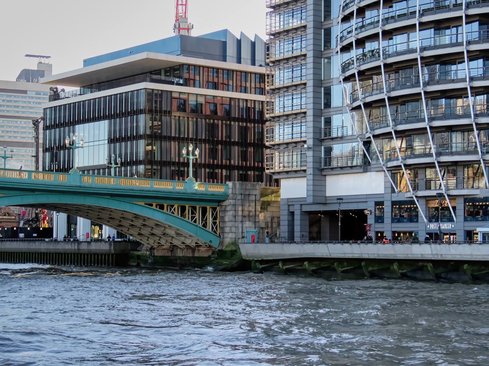 Southwark Bridge and the Bankside offices beside it, seen from the River Thames