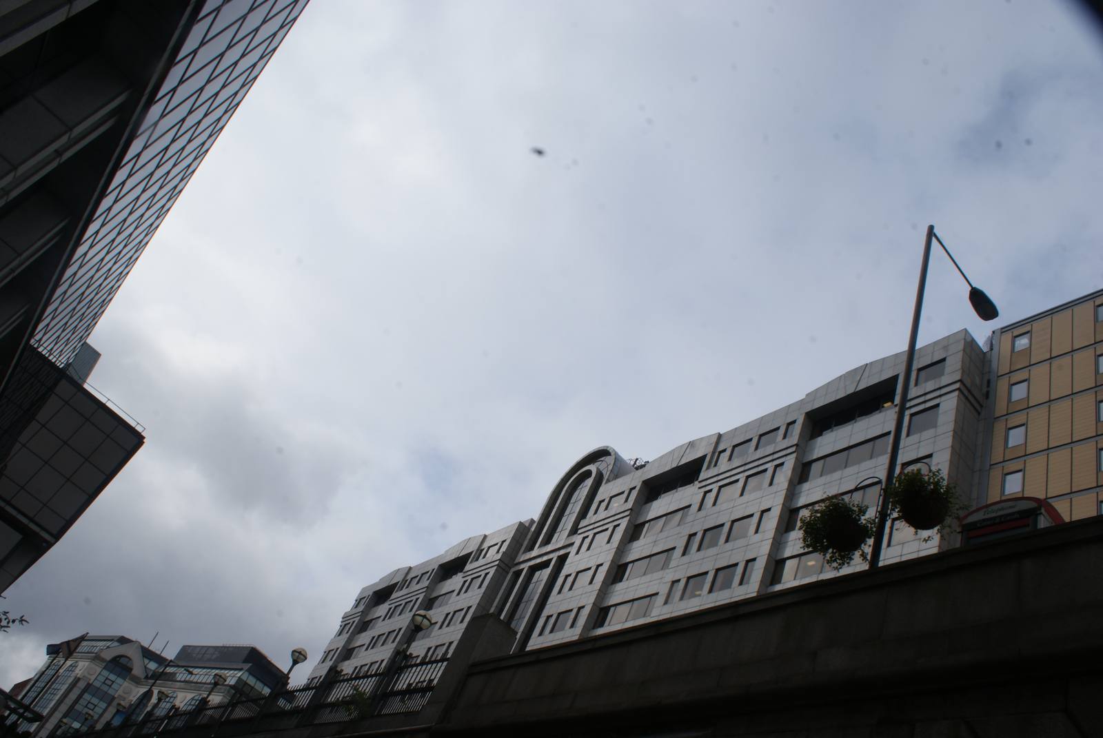 Riverside House in Southwark, London, seen from below against a cloudy sky