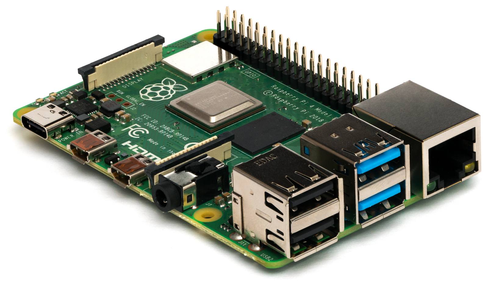 A green Raspberry Pi 4 circuit board with USB and ethernet ports, photographed against a white background