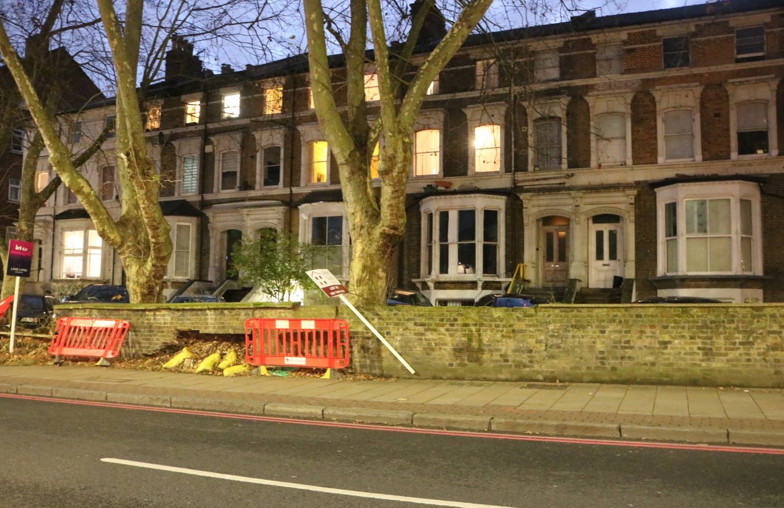 Victorian terraced houses in London at dusk